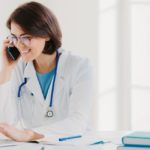 doctor talking to coolsculpting customers over the phone