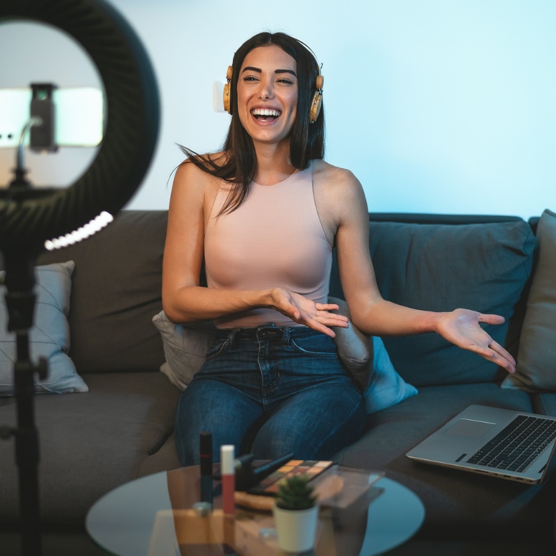 an influencer, someone taking video of themselves or filming themselves
